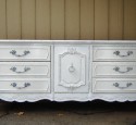 White dressers and nightstands