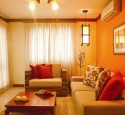Decorate living room orange walls