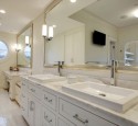 Framed mirrors over bathroom vanities