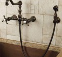 Wall mount kitchen faucet with hand spray