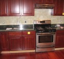 Cherry kitchen cabinets backsplash ideas