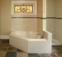 Subway tiles in bathroom with floor