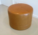 Yellow round storage ottoman