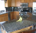 Granite kitchen countertops with oak cabinets