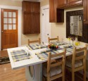 Folding dining table attached to wall