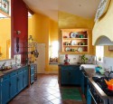 Rustic yellow kitchen cabinets
