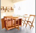 Folding dining table with storage